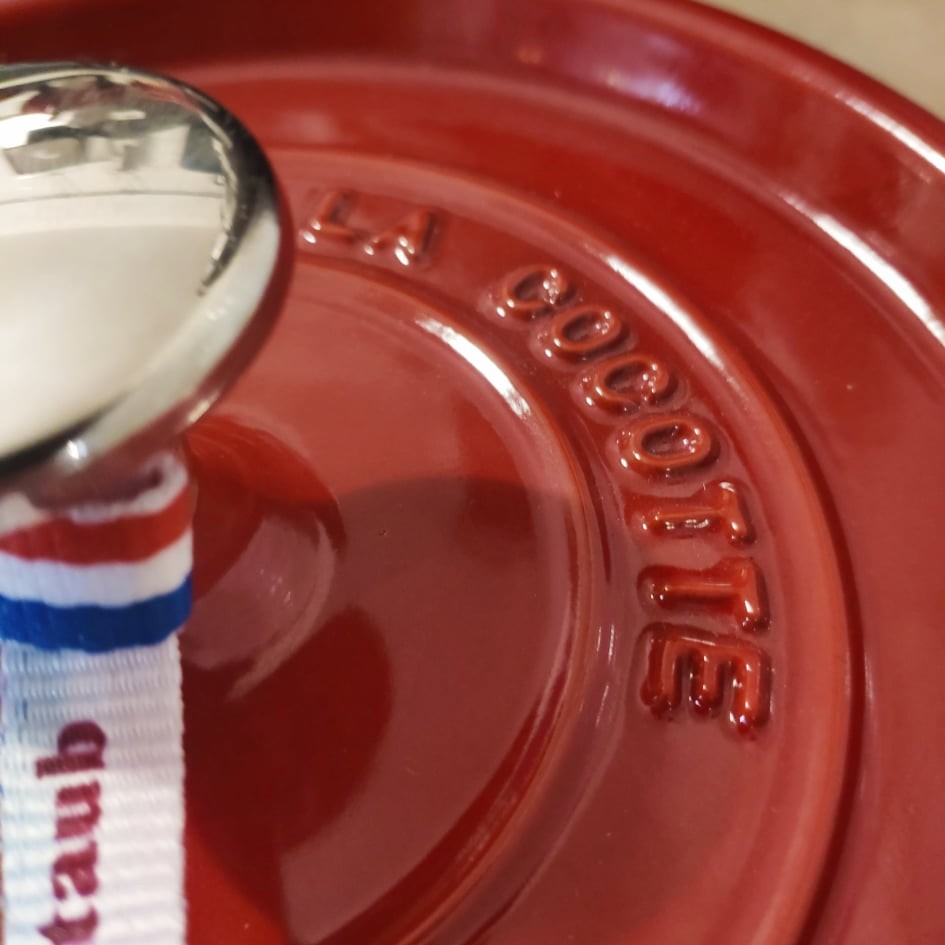 Round cherry cast iron casserole