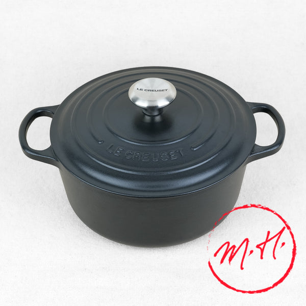Cocotte ronde Le Creuset en fonte émaillée noire mate avec couvercle et bouton inox, fabrication française
