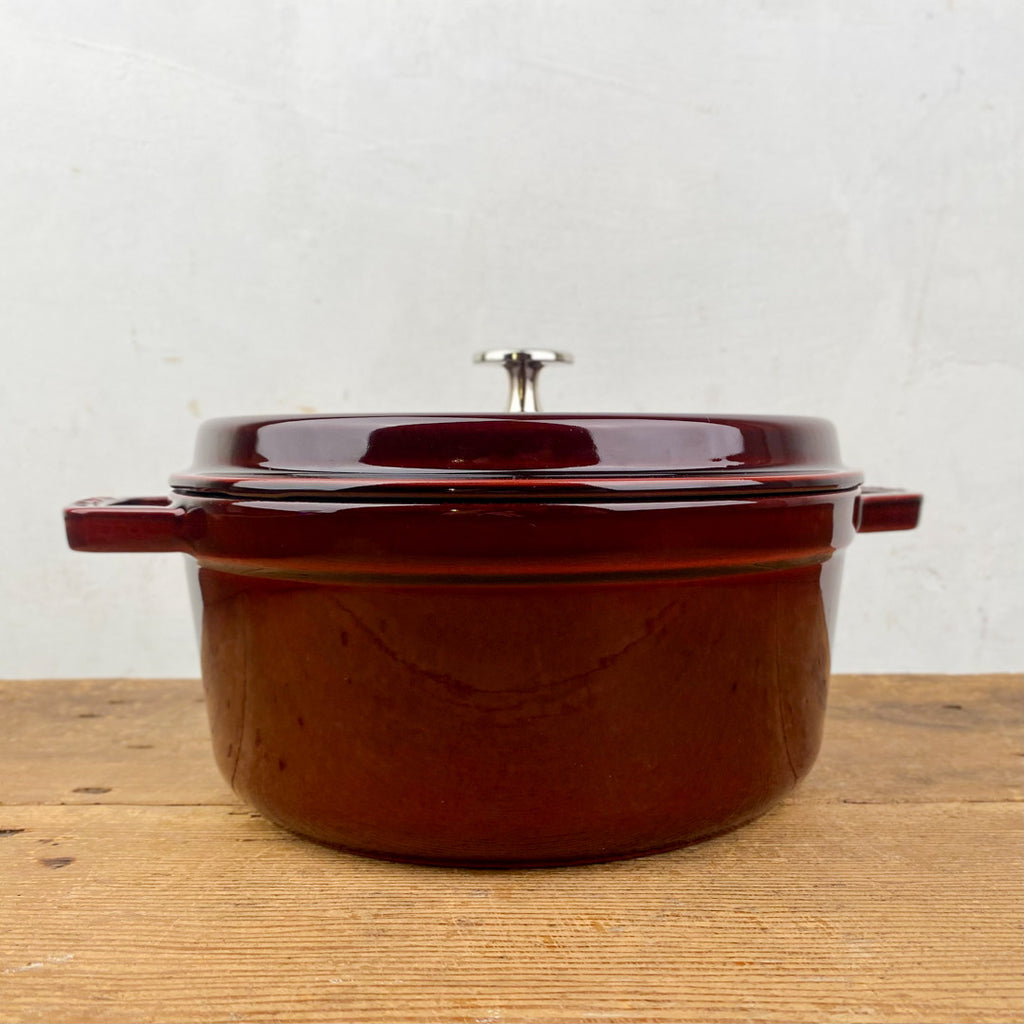 Round cast-iron casserole, garnet-red