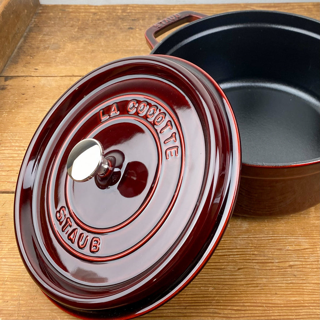 Round cast-iron casserole, garnet-red