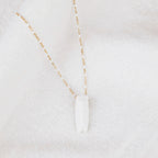 White and gold cicada necklace