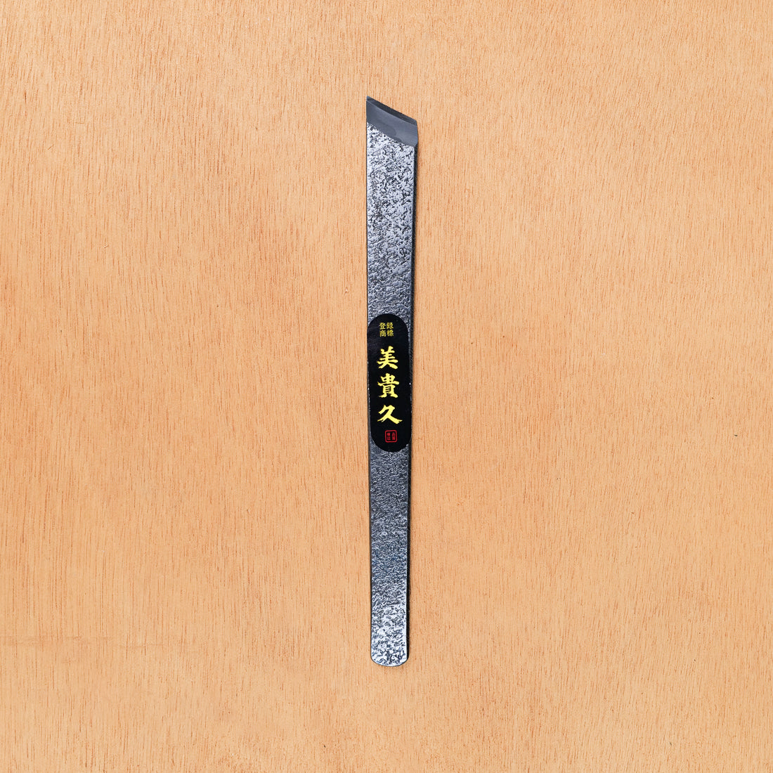 Forged steel marking knife for woodworking, Takagi kiridashi made in Japan, black and gold label on the blade