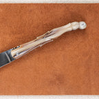 Couteau Laguiole en inox avec manche aile de pigeon en corne