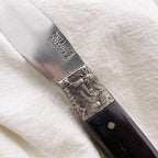 knife with engraved silver bolster