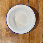White enamel bowl with blue border