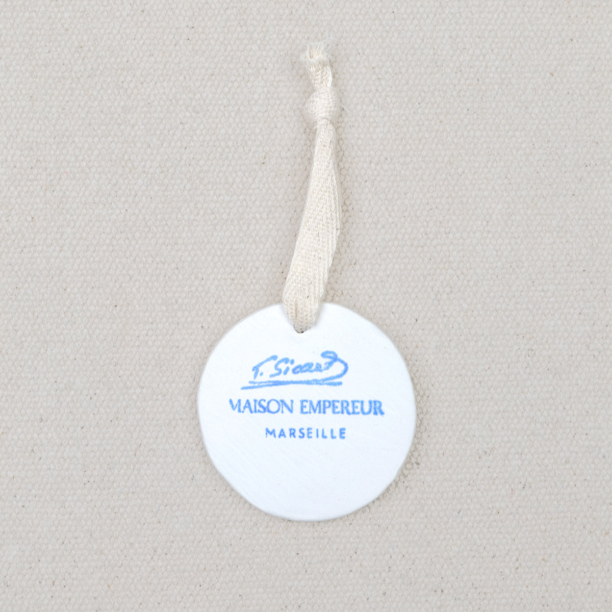 Revers du médaillon diffuseur en faïence Louis Sicard Maison Empereur Marseille, biscuit provençal fait main 5,5 cm
