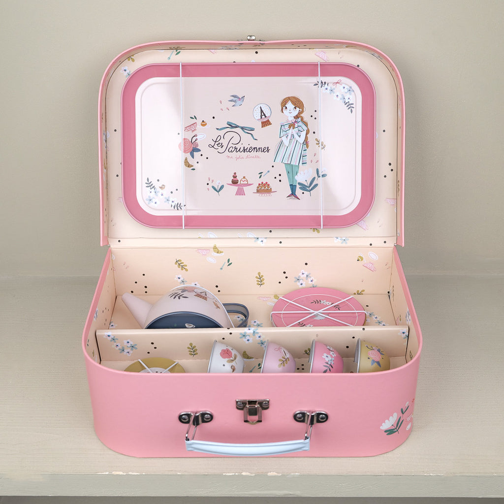 Toy tea set in a suitcase