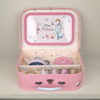 Toy tea set in a suitcase