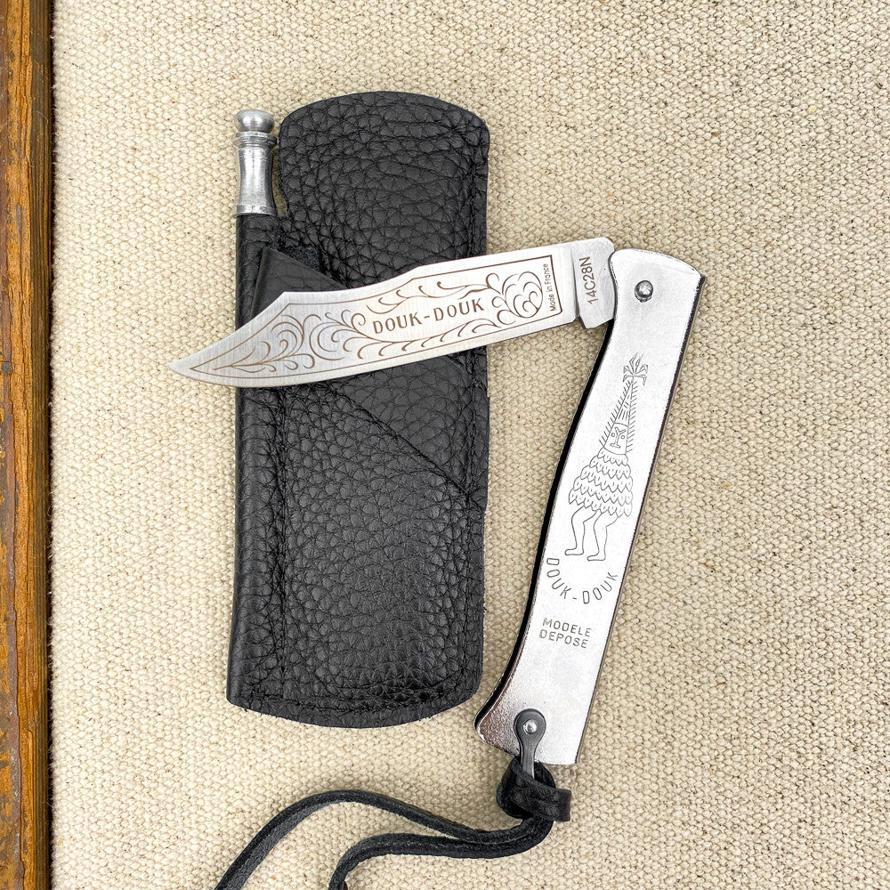 Douk-Douk and its leather case