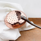 Copper and cast iron skimmer