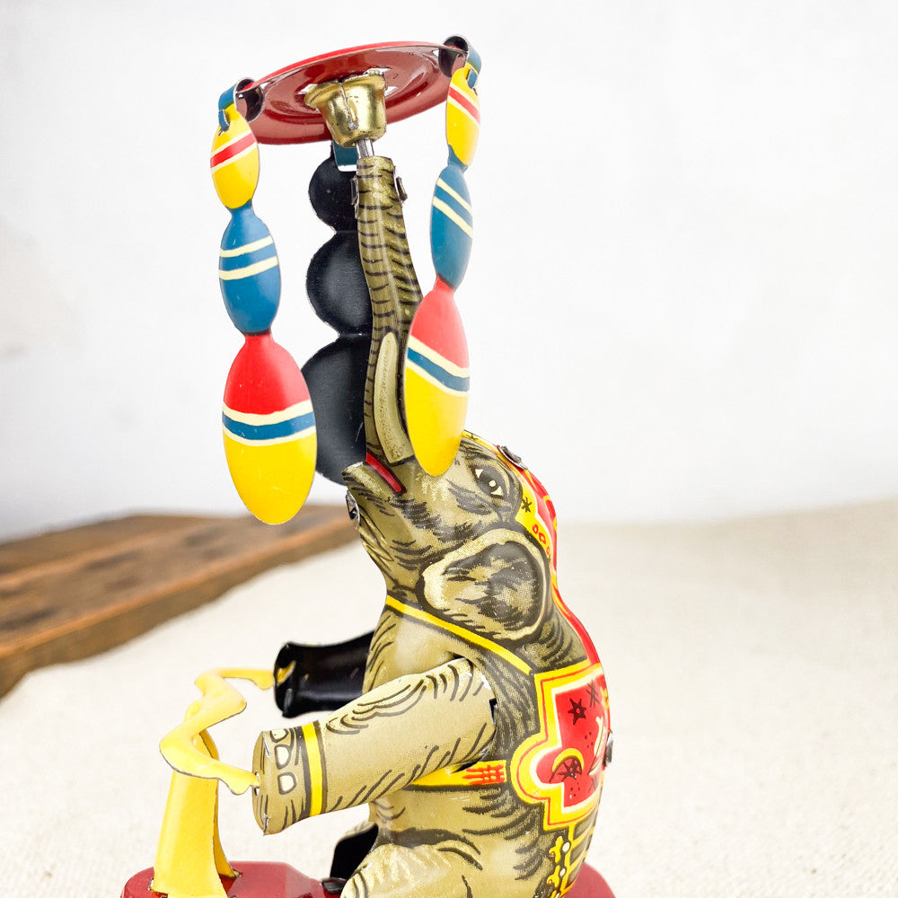 Elephant on mechanical tricycle