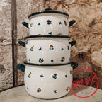 Enamelled casserole with floral design