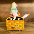 Wind-up farmer's wife with goose toy
