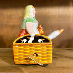 Wind-up farmer's wife with goose toy