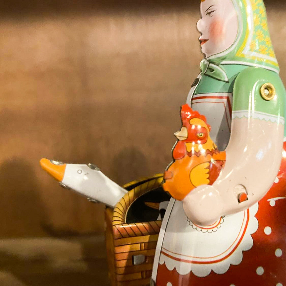 Farmer's wife with goose vintage toy details
