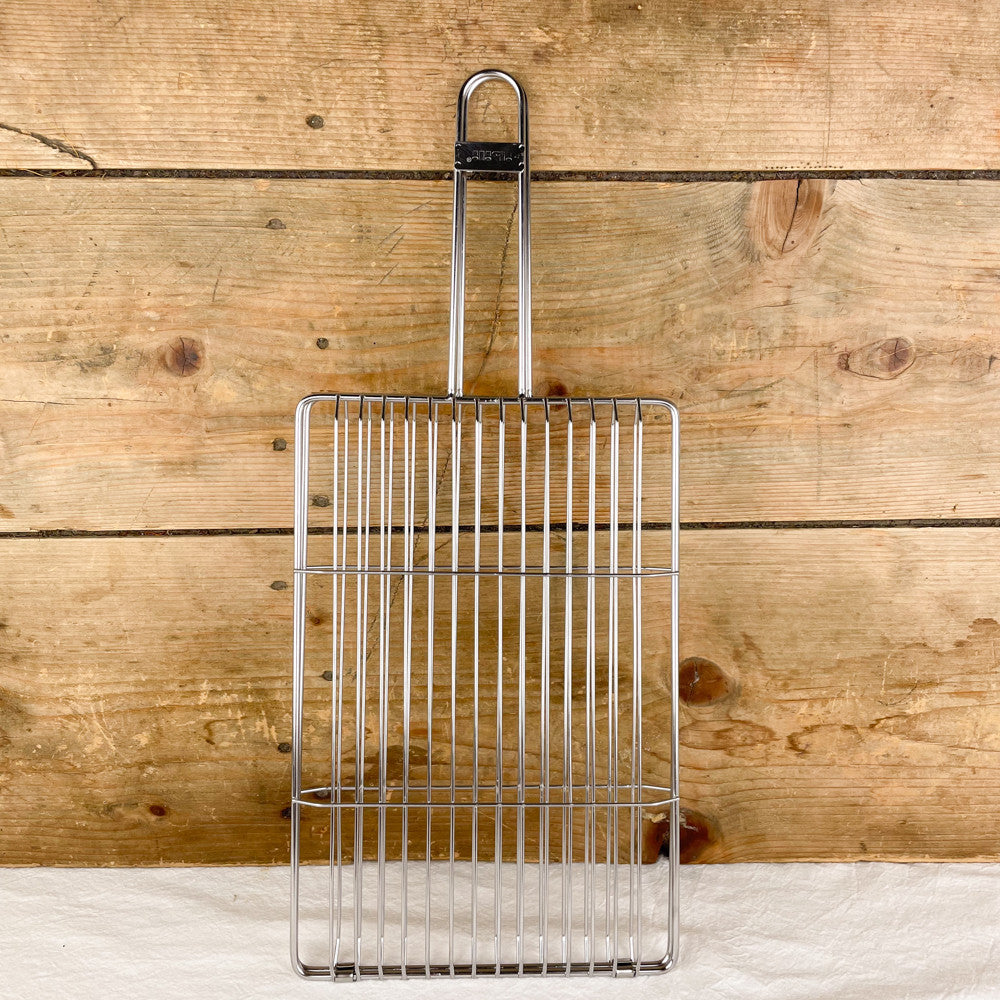 Double grill for barbecue