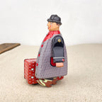 Man with red suitcase