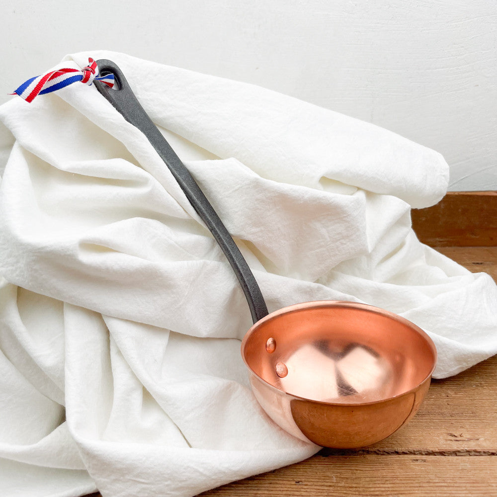 Copper and cast iron ladle