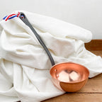 Copper and cast iron ladle