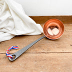 Copper and cast iron ladle
