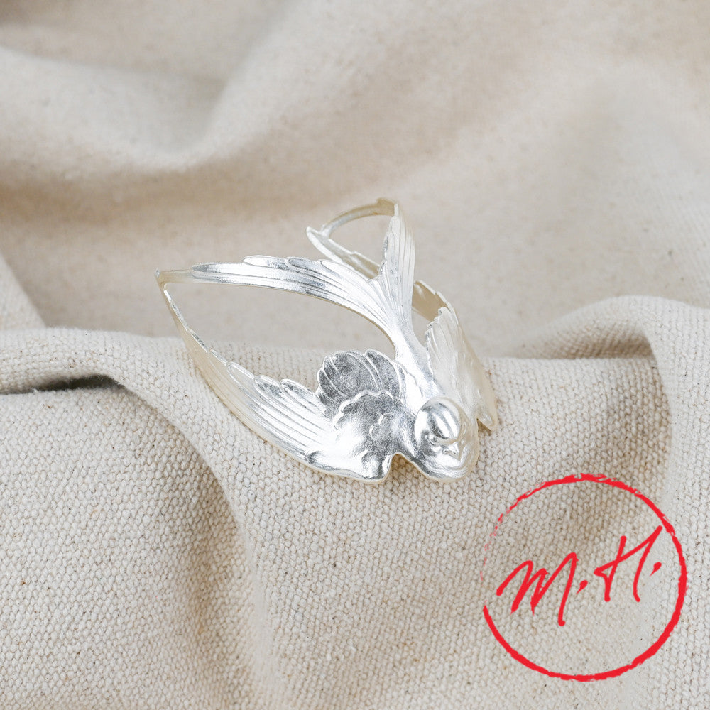 Silver swallow cuff