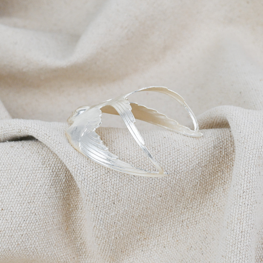 Silver swallow cuff