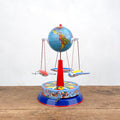 Wind-up aeroplane carousel in painted tin