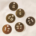 Number medallion in brass