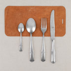 Ornate pewter 24-piece cutlery set