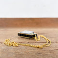 Mini harmonica with gold chain