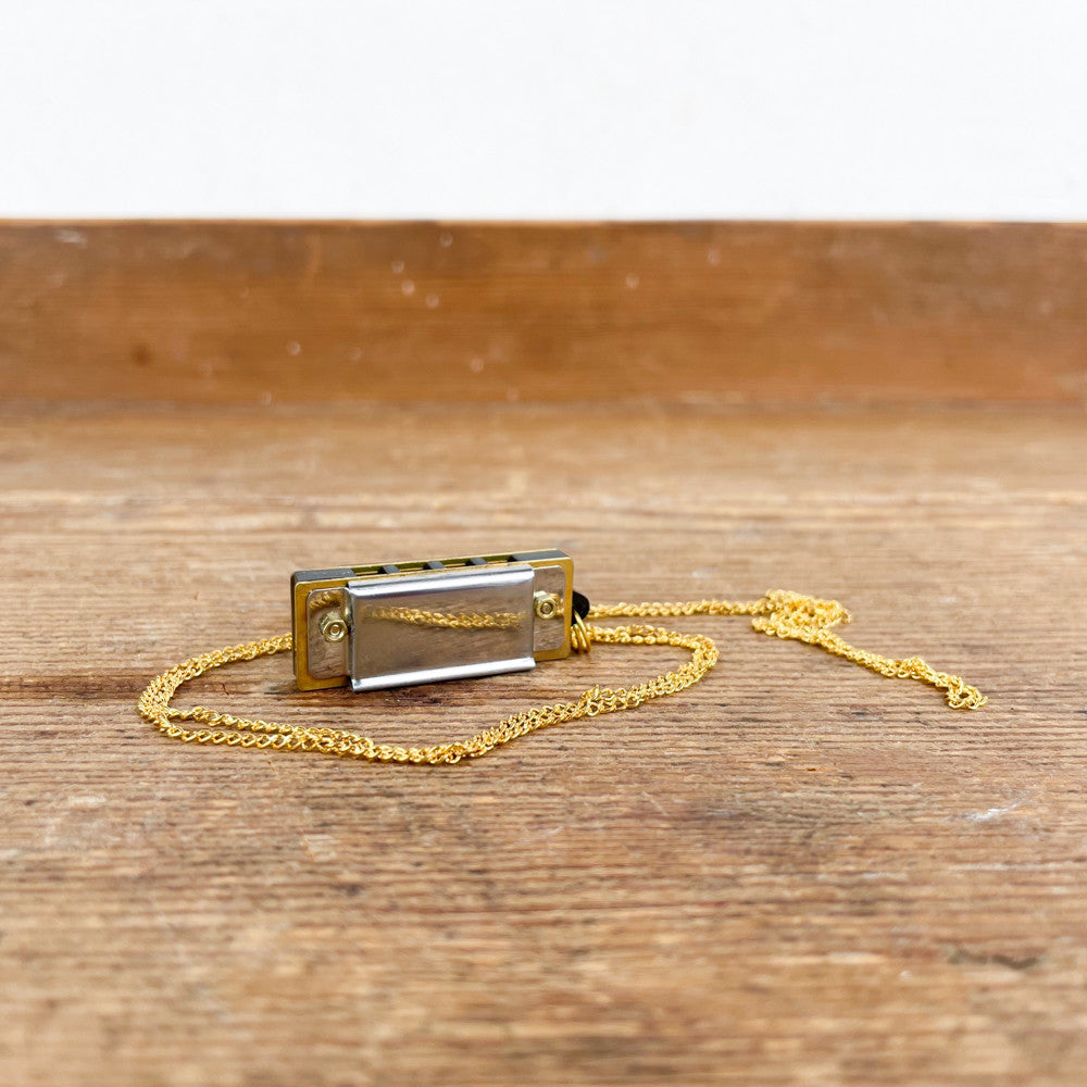 Mini harmonica with chain
