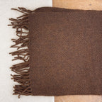 Throw in coloured woven wool 130 x 200 cm