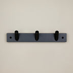 Porte-manteau en bois noir