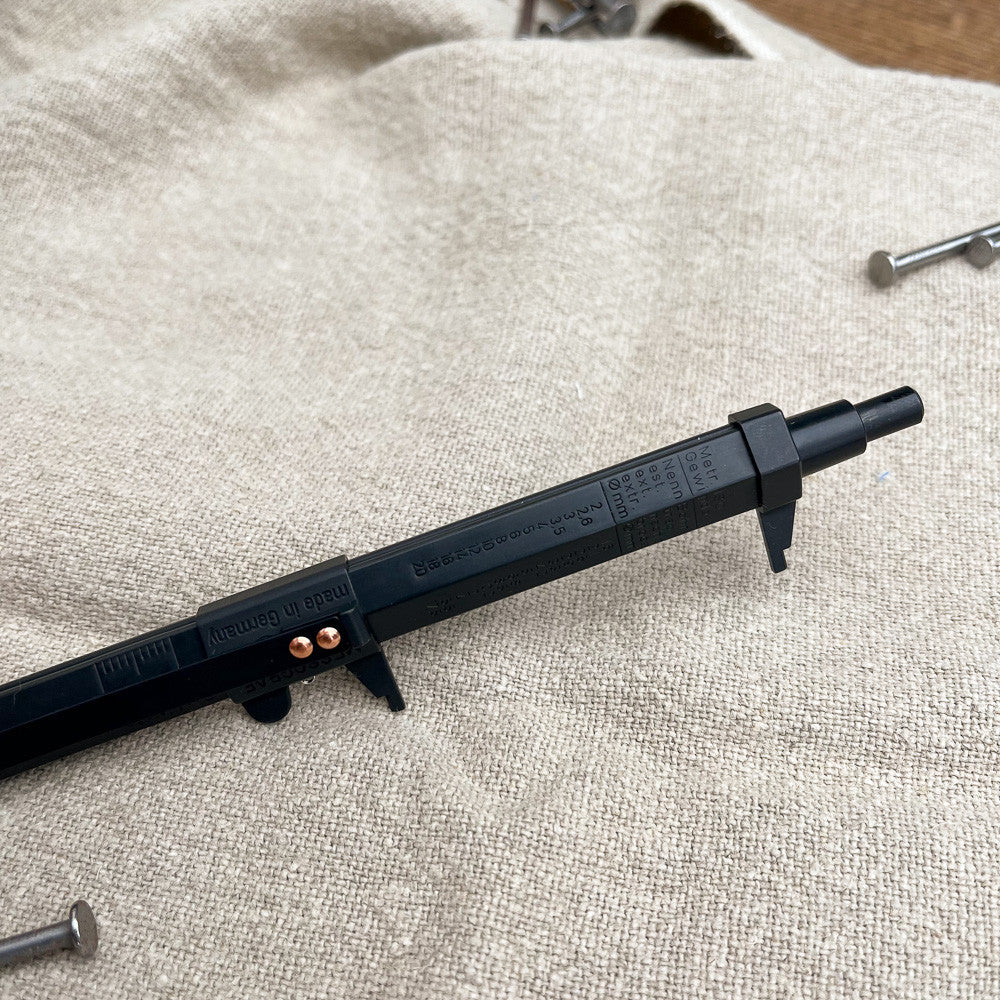 Mechanical pencil caliper