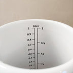 Pot mesureur émail blanc