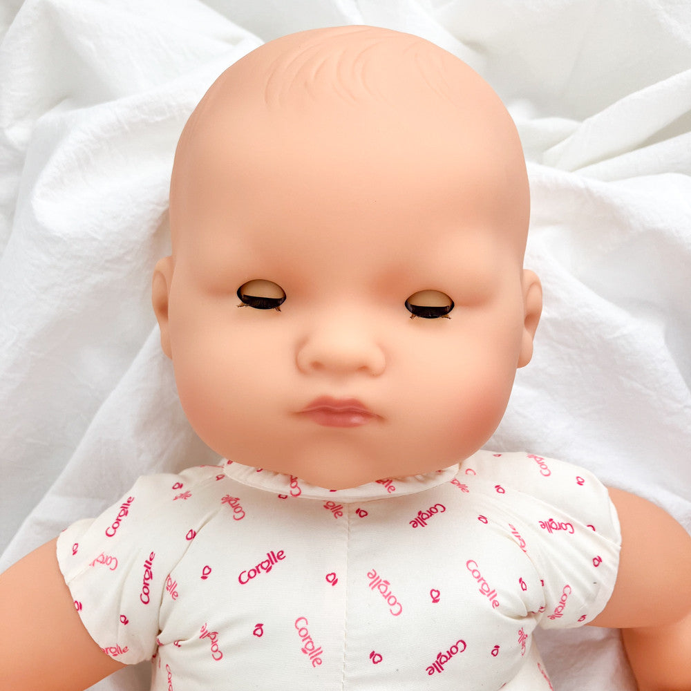 ponpon corolles yeux fermés