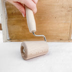 Rouleau conique à étaler la pâte