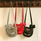 Sac bandoulière avec pince à cheveux