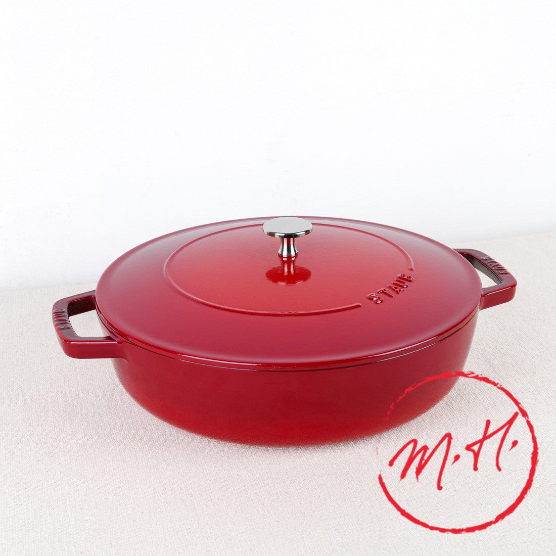 Sauteuse ronde en fonte cerise