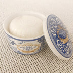 Savon en boîte bleu et or