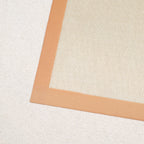 Tapis de cuisson silicone micro ajouré De Buyer bords oranges