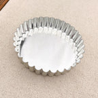 Tartelette en fer blanc à fond mobile