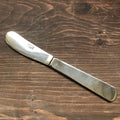 One-piece spreader