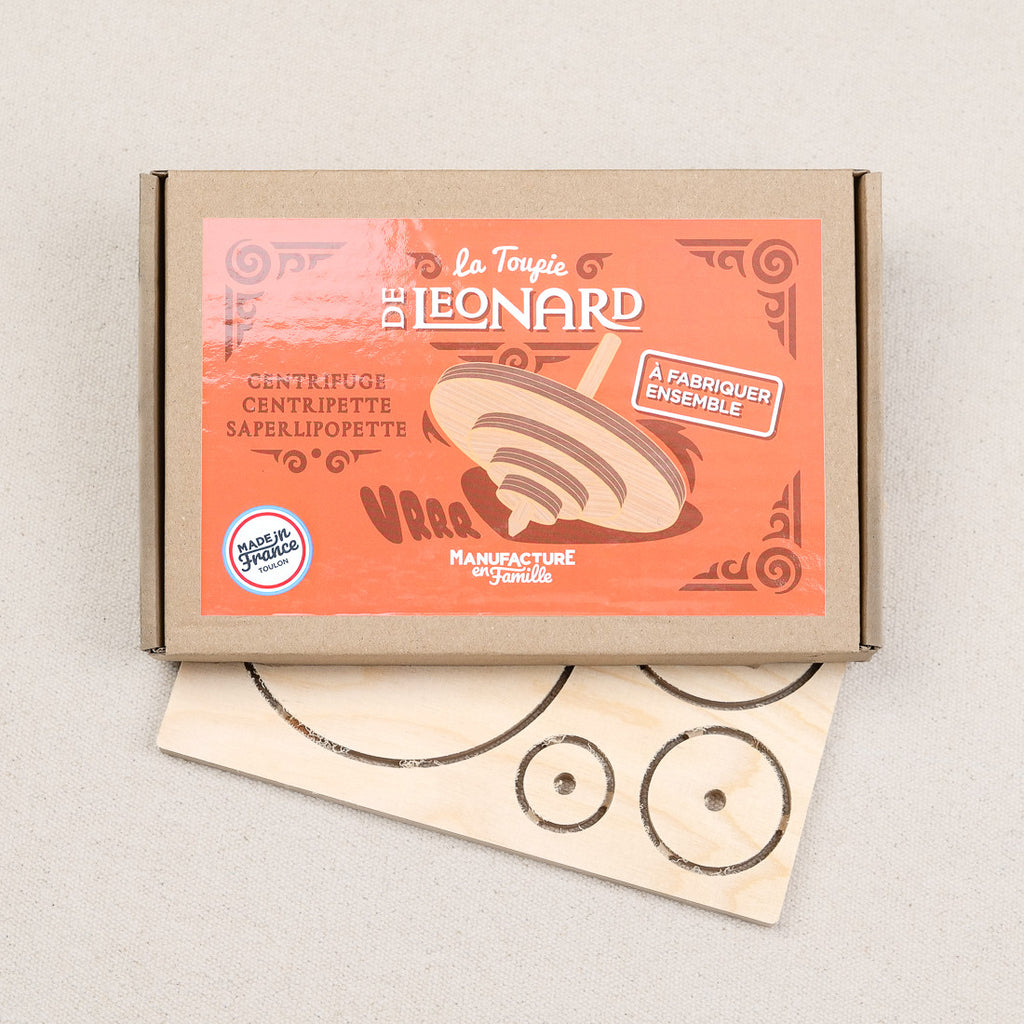 Wooden spinning top to assemble