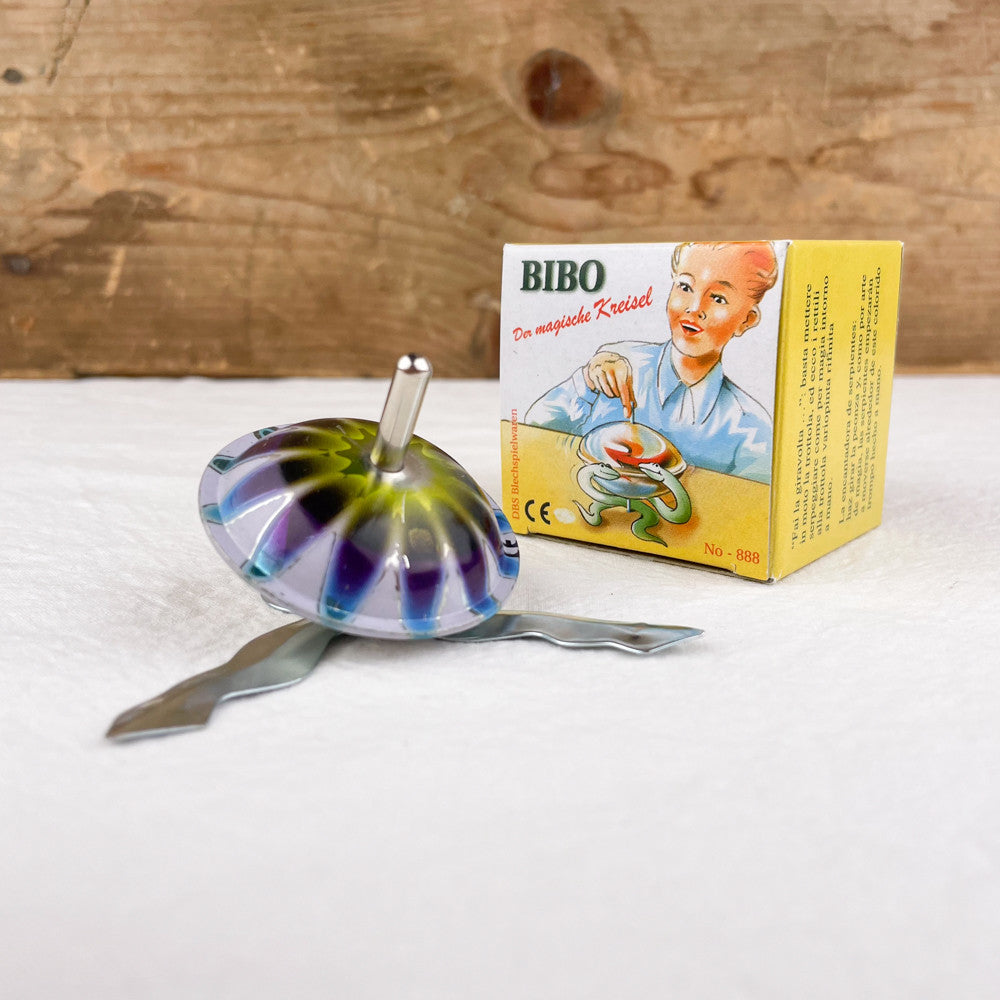 Magnetic spinning top