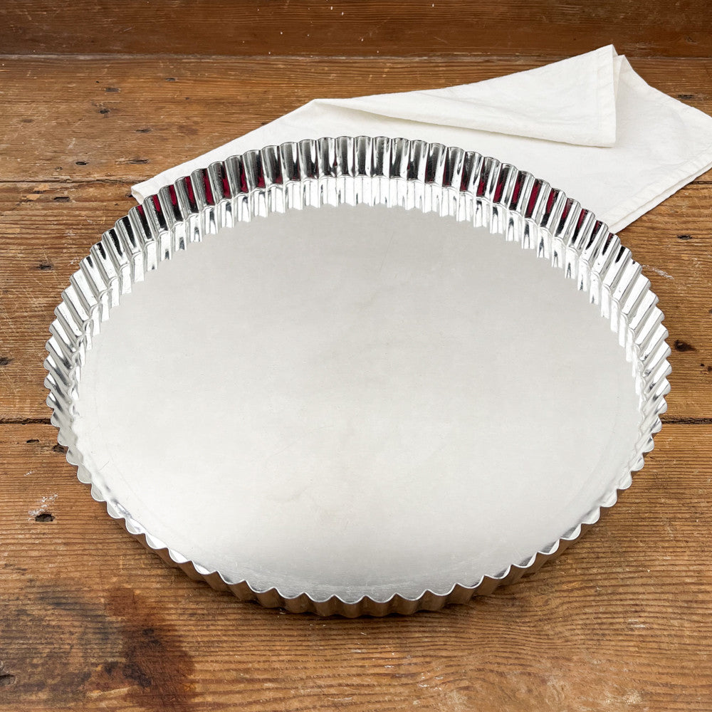 Tourtière en fer blanc