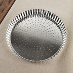Tourtière perforée en fer blanc