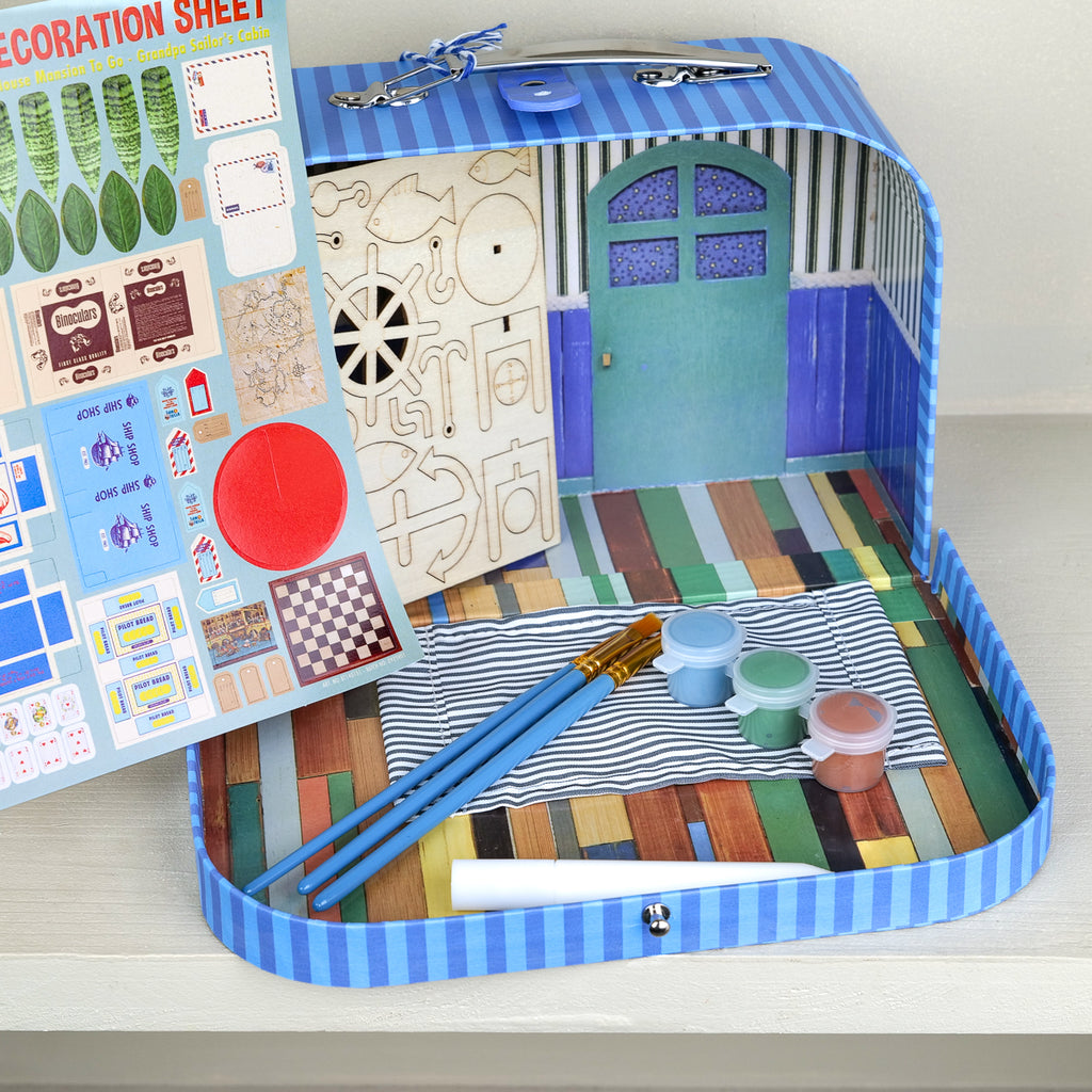 Cardboard suitcase craft kit with miniature sailor's cabin, blue striped case, for kids ages 4+