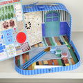 Cardboard suitcase craft kit with miniature sailor's cabin, blue striped case, for kids ages 4+