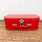 Red cardboard suitcase